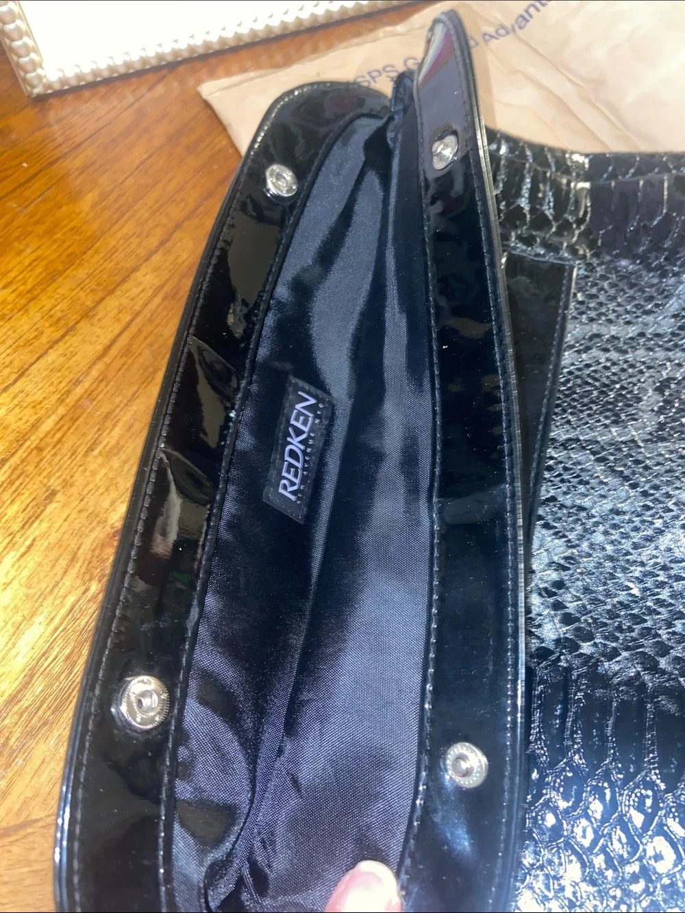 REDKEN Snake-Embossed Black and Silver Women's Clutch